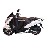 Coprigambe Termoscud R223X, un coprigambe impermeabile e termico. In uso su scooter. Di Tucano Urbano.
